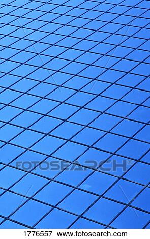 Stock Photo - Symmetrical pattern of blue squares. Fotosearch