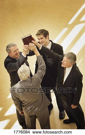 Businessmen with Bible View Large Photo Image Picture - Businessmen with Bible. Fotosearch