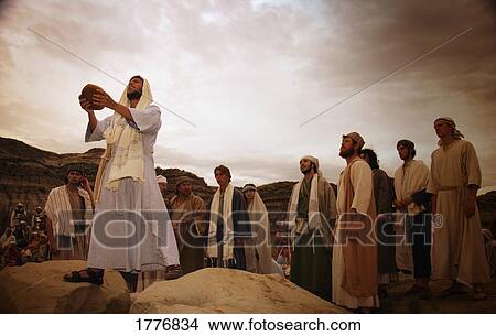 Disciples around as Jesus blesses bread View Large Photo Image Picture - Disciples around as Jesus blesses bread. Fotosearch