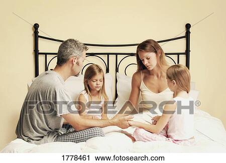 Family praying View Large Photo Image Stock Image - Family praying. Fotosearch
