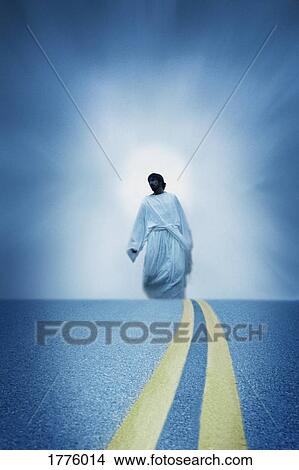 Jesus walks along a modern road View Large Photo Image Picture - Jesus walks along a modern road. Fotosearch