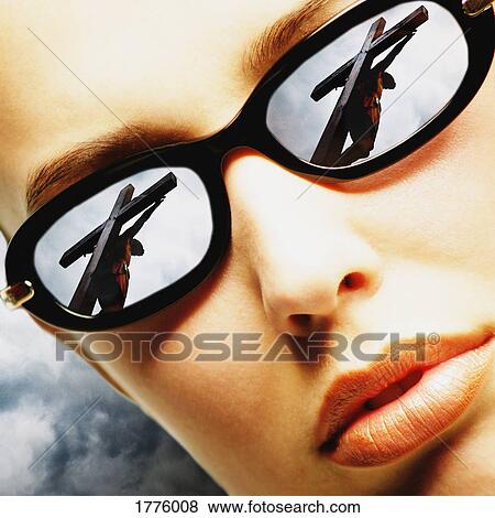 Stock Photo - Reflection of the crucifix. Fotosearch