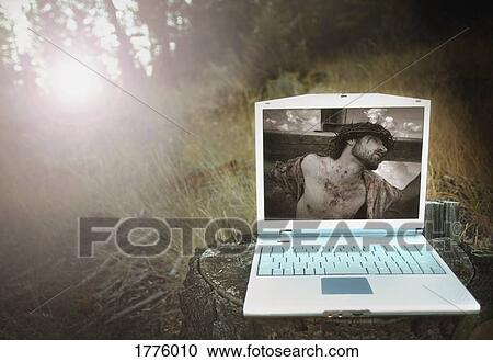 the Crucifixion on a lap top View Large Photo Image Stock Image - the Crucifixion on a lap top. Fotosearch