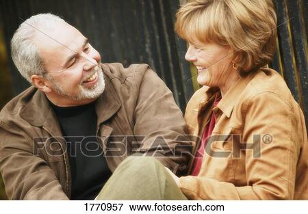 Couple talking View Large Photo Image Stock Photo - Couple talking. Fotosearch
