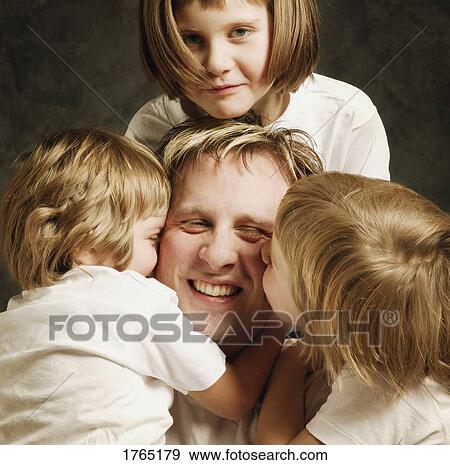 Stock Photo - Father with daughters. Fotosearch
