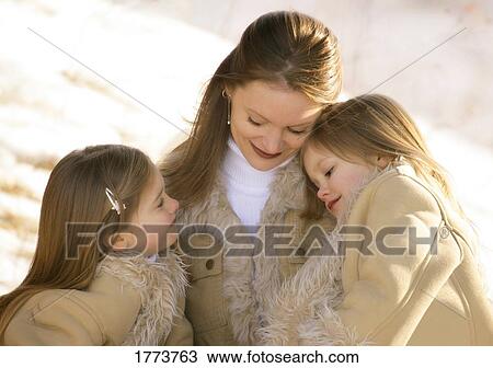 Stock Image - Mother and daughters. Fotosearch