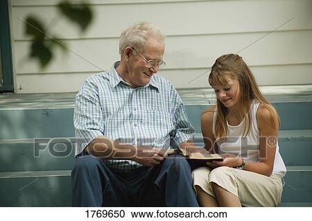 Reading together View Large Photo Image Stock Image - Reading together. Fotosearch