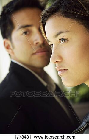 A close-up (close up closeup) of two business people View Large Photo Image Stock Image - A close-up (close up closeup) of two business people. Fotosearch