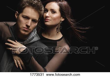 Stock Image - Close couple in a hug. Fotosearch