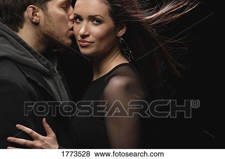 Stock Photo - Close couple in an embrace. Fotosearch