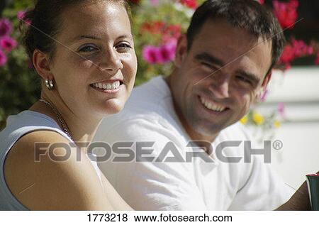 Stock Photo - Couple enjoying the outdoors. Fotosearch