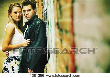 Stock Photograph - Couple holding each other. Fotosearch