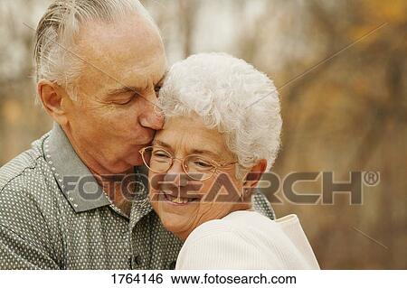 Stock Photograph - Couple kiss. Fotosearch