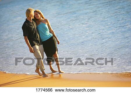 Couple on beach View Large Photo Image Stock Photograph - Couple on beach. Fotosearch
