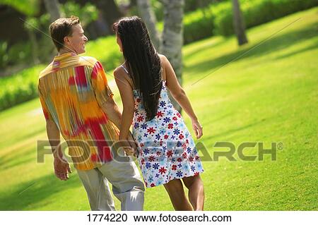 Stock Image - Couple walking. Fotosearch