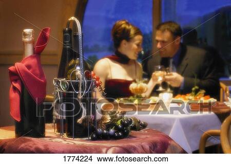 Picture - Couple's romantic meal. Fotosearch