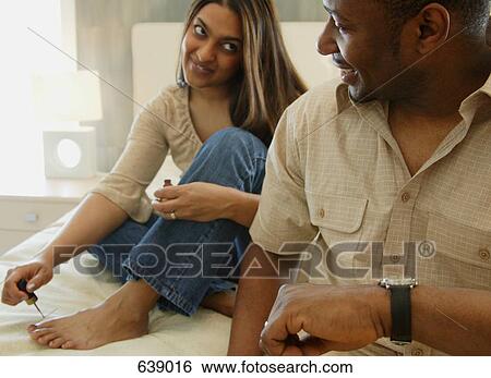 Stock Photograph - Man waits for woman. Fotosearch