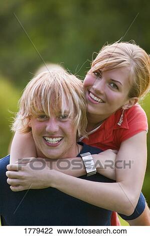 Portrait of a young couple View Large Photo Image Stock Image - Portrait of a young couple. Fotosearch
