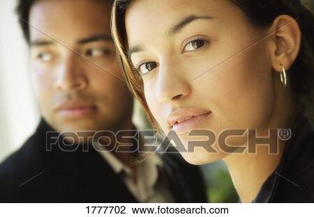 Stock Image - Two business people. Fotosearch
