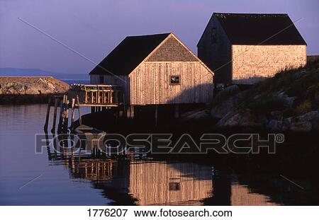 Boathouse and jetty early in the morning View Large Photo Image Stock Photo - Boathouse and jetty early in the morning. Fotosearch