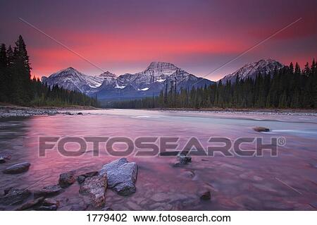 Stock Image - Rocky Mountains and Athabasca River Jasper National Park. Fotosearch