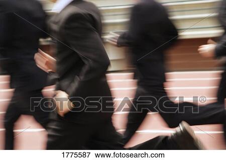 Businessmen in a race View Large Photo Image Stock Photo - Businessmen in a race. Fotosearch
