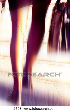 Stock Image - Businesswoman in motion. Fotosearch