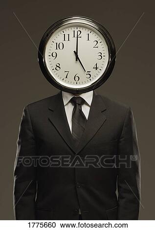 Man in suit with clock face View Large Photo Image Stock Image - Man in suit with clock face. Fotosearch