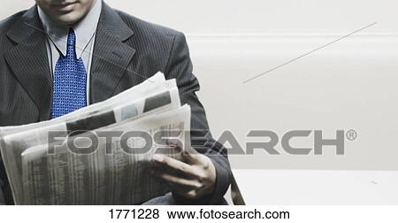 Man reading the newspaper View Large Photo Image Stock Photo - Man reading the newspaper. Fotosearch