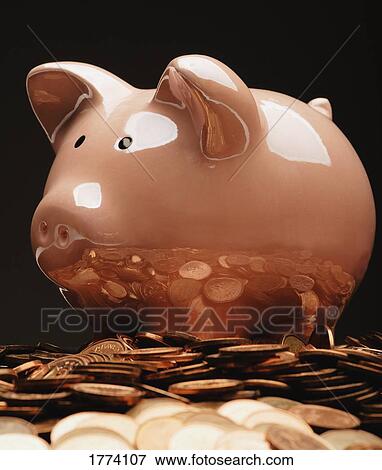 Piggy bank and riches View Large Photo Image Stock Photo - Piggy bank and riches. Fotosearch