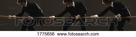 Three men in suits pulling on a rope in a tug 'o' war View Large Photo Image Stock Photograph - Three men in suits pulling on a rope in a tug 'o' war. Fotosearch