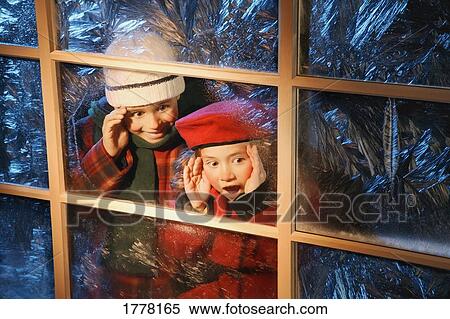 Children looking through shop window View Large Photo Image Stock Photography - Children looking through shop window. Fotosearch
