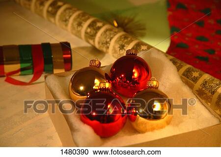 Stock Image - Christmas decorations and wrapping paper. Fotosearch