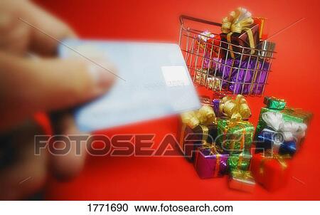Shopping trolley, gifts and credit card View Large Photo Image Stock Image - Shopping trolley, gifts and credit card. Fotosearch