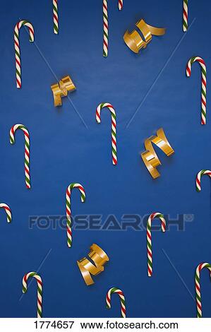 Stock Photo - Design of candy canes and gift ribbon. Fotosearch