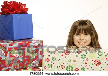 Girl with presents View Large Photo Image Picture - Girl with presents. Fotosearch