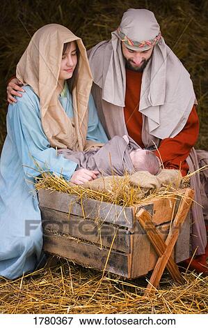 Stock Photo - Mary and Joseph with baby Jesus. Fotosearch