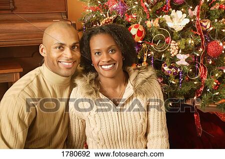 Portrait of a couple at Christmas View Large Photo Image Stock Image - Portrait of a couple at Christmas. Fotosearch