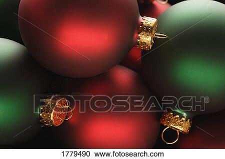 Stock Image - Red and green Christmas balls. Fotosearch