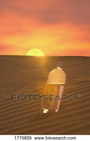 Bottle of water in the sand View Large Photo Image Stock Photography - Bottle of water in the sand. Fotosearch