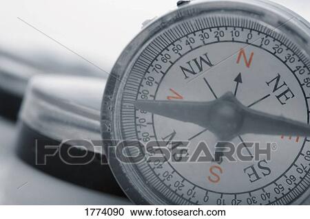Stock Image - close up of compass. Fotosearch