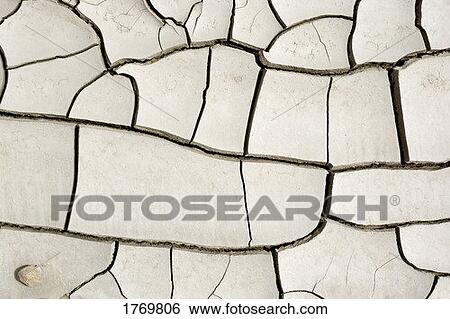 Cracked earth View Large Photo Image Stock Photograph - Cracked earth. Fotosearch