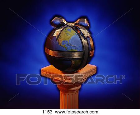 Stock Image - Globe on stand with bow. Fotosearch