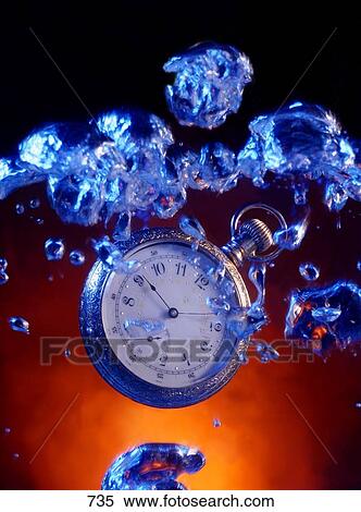 Pocket watch with bubbles and red background View Large Photo Image Stock Photography - Pocket watch with bubbles and red background. Fotosearch