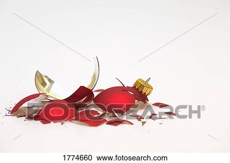 Stock Image - Shattered Christmas Bulb. Fotosearch