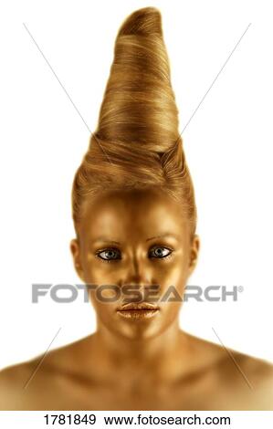 Stock Photo - Woman with a golden face. Fotosearch
