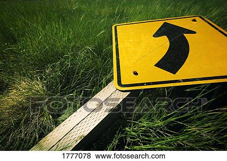 Yellow road sign on the ground View Large Photo Image Stock Photo - Yellow road sign on the ground. Fotosearch