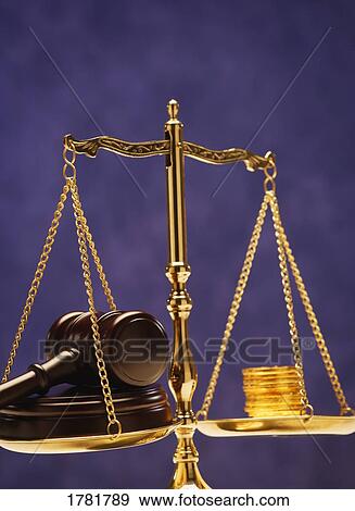 Stock Photo - Balancing money and justice. Fotosearch
