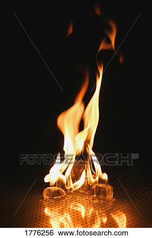Blazing ice cubes View Large Photo Image Stock Photograph - Blazing ice cubes. Fotosearch
