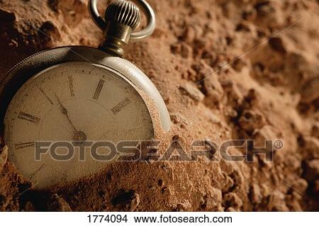 Buried pocket watch View Large Photo Image Picture - Buried pocket watch. Fotosearch